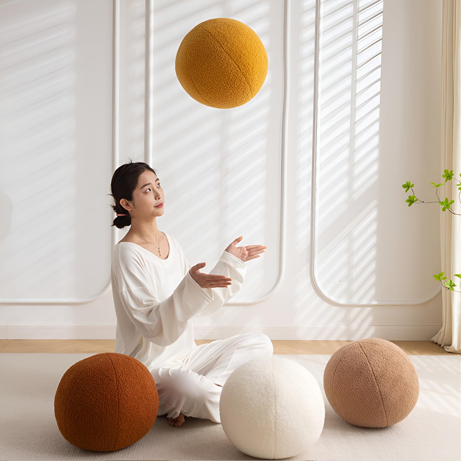 Gerlisay cream white ball pillow adds a soft decor accent