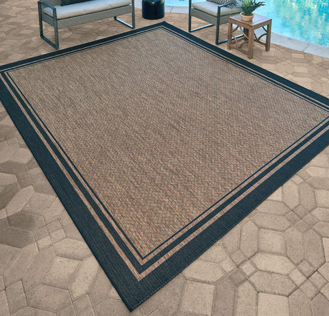 Gertmenian indoor outdoor rug on patio deck showing versatile placement.