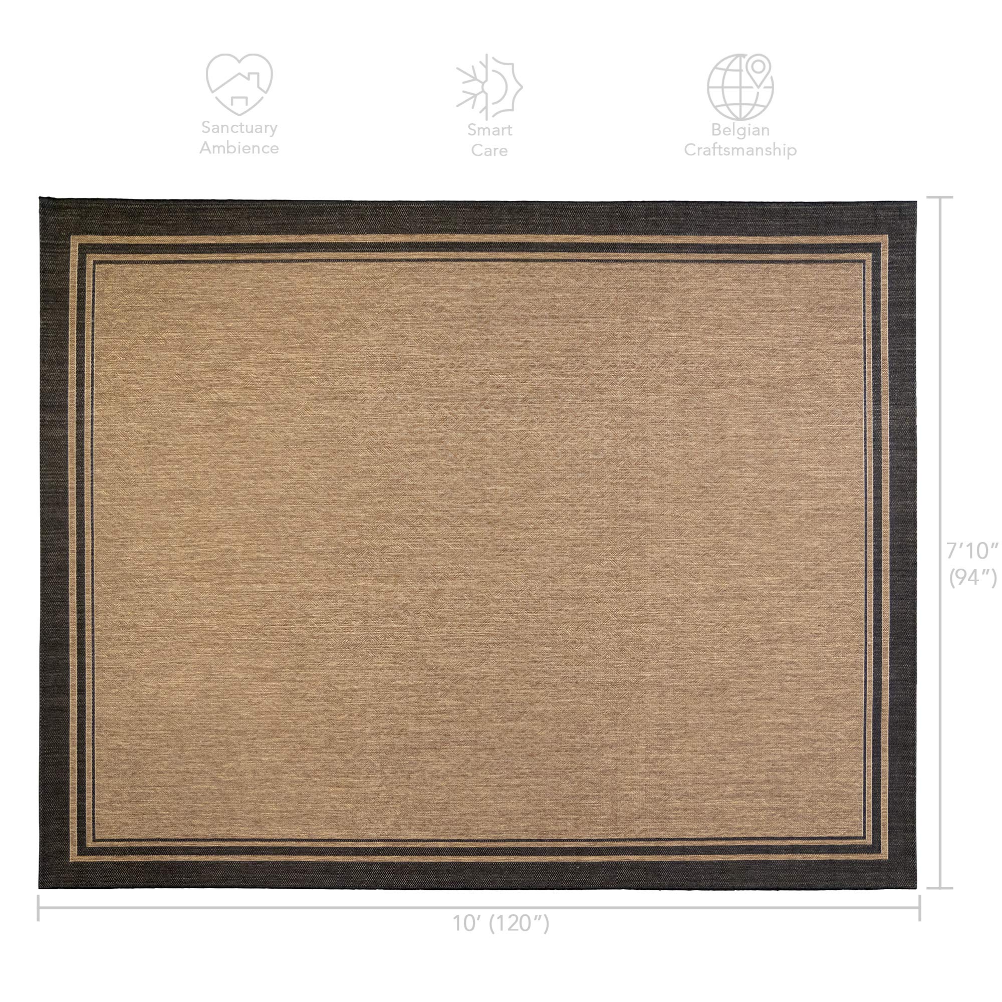 Gertmenian smart-care rug being cleaned with a garden hose.