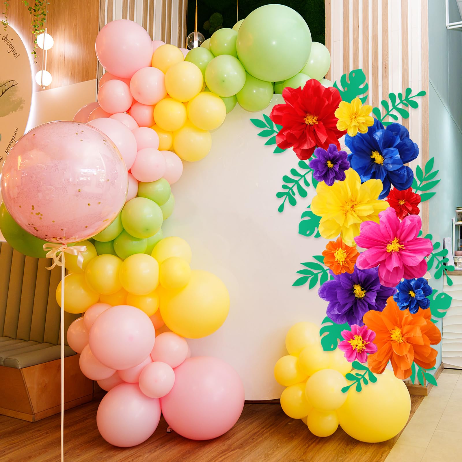 Geyee dark blue giant paper flower adds vibrant color accents.