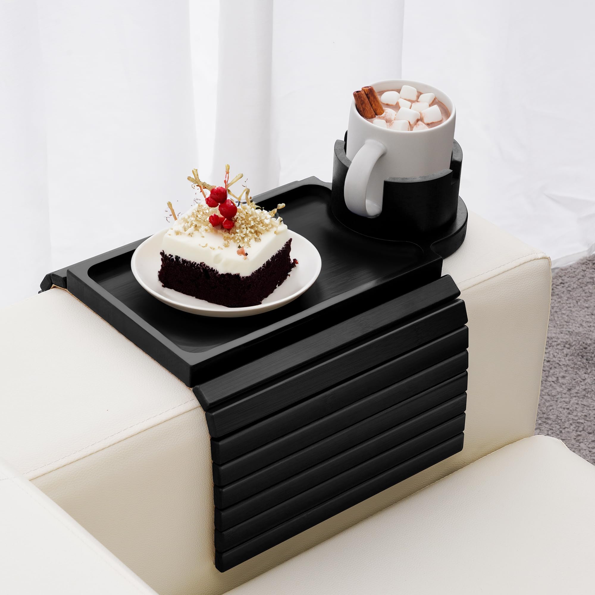 GHKINMAL couch cup holder tray on an armrest keeps drinks within easy reach.