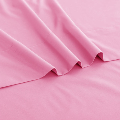 Ghooss pink sheets breathe for all-season comfort and temperature balance.