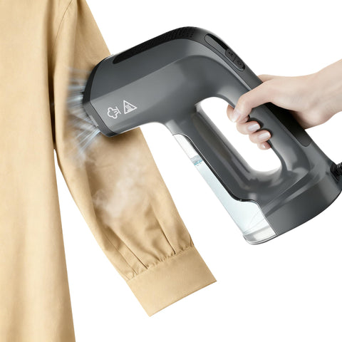 GHORA vacuum steamer clinging to a hanging garment for easy one-handed smoothing