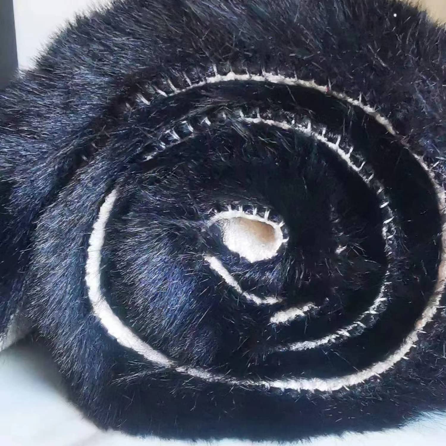 Ghouse multi-use faux fur rug in black, perfect for decor, gifting, and seasonal styling.