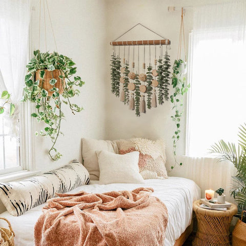 GIAUMA wicker ball and beige fringe add tactile boho accents to décor.