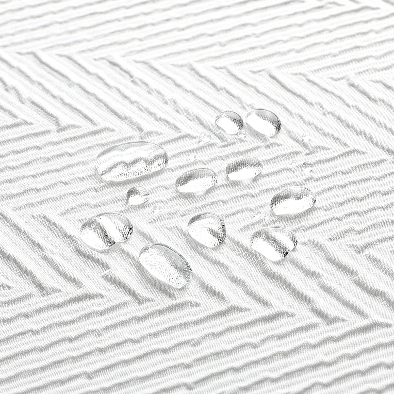 Gibelle White Shower Curtain creates a spa-like bath ambiance with a crisp white finish.