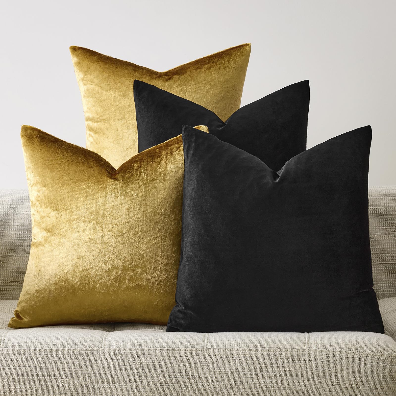 GIGIZAZA gold velvet pillow cover adds luxe shine to a sofa.