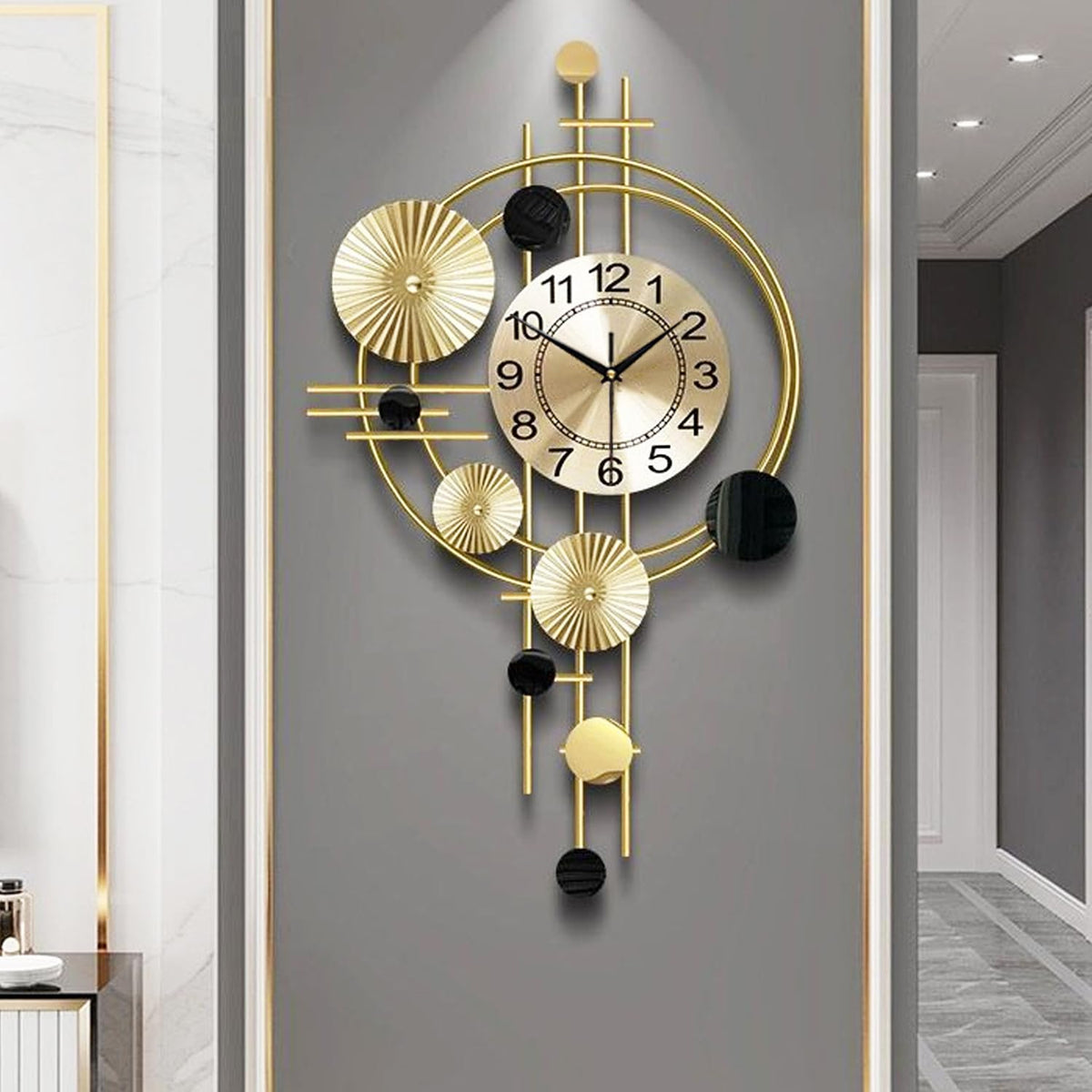 Gilacco large wall clock with golden face and bold numerals for easy reading from any angle.