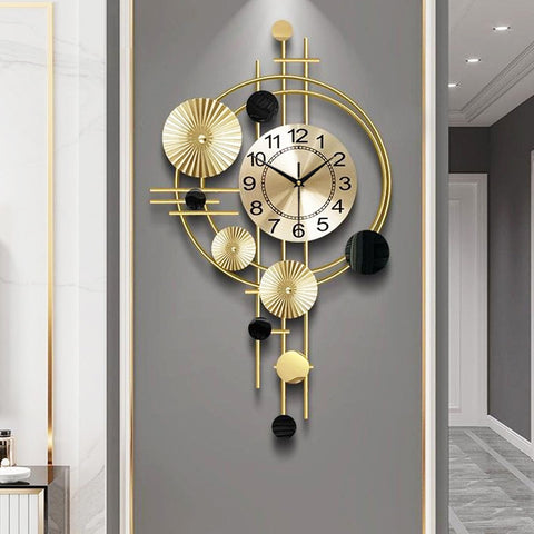 Gilacco large wall clock with golden face and bold numerals for easy reading from any angle.