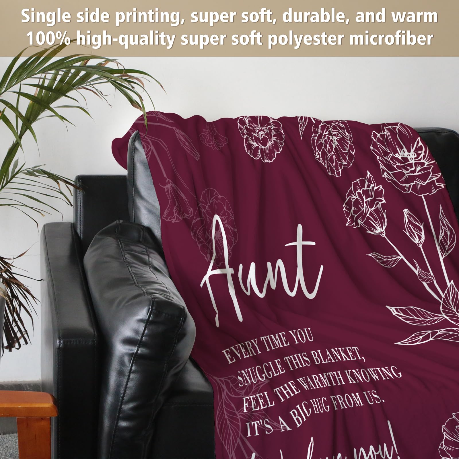 GiltGlimmer burgundy throw displayed on bed for warm decor.