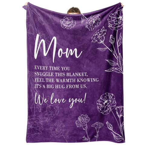 GiltGlimmer mom blanket with heart-text on sofa for cozy moments.