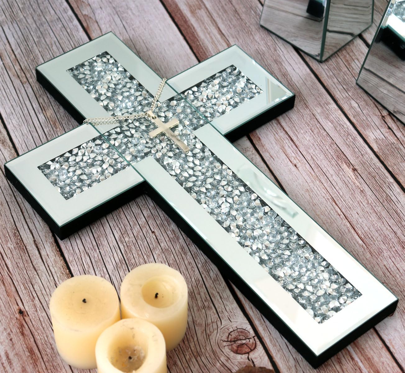 GIMORRTO mirrored glass cross reflects light for an airy, elegant vibe.