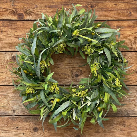 GinzeTop olive wreath adds Mediterranean charm for weddings and events.