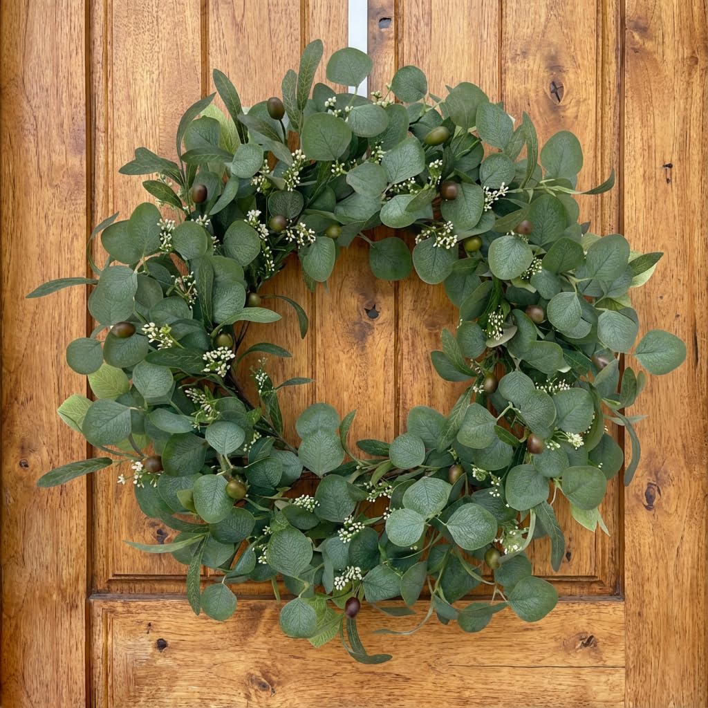 GinzeTop wreath on porch elevates entryway with welcoming vibe.