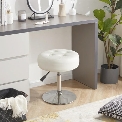 Gitrah height-adjustable vanity chair enables precise seating for makeup tasks.