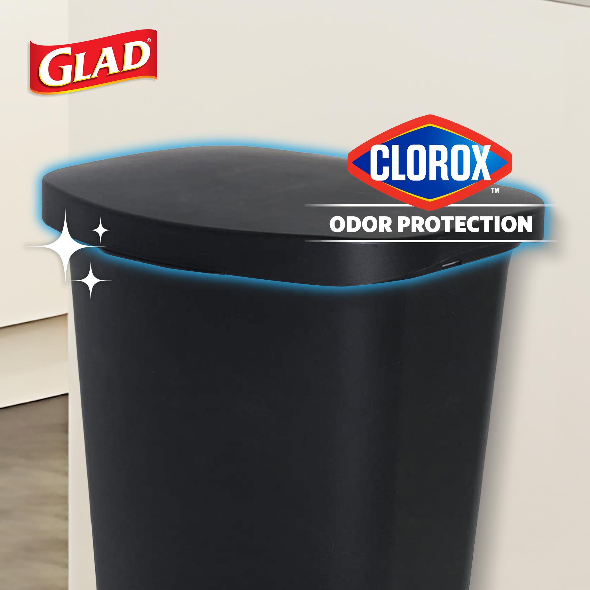 Glad kitchen trash can with foot pedal enables hands-free waste disposal.