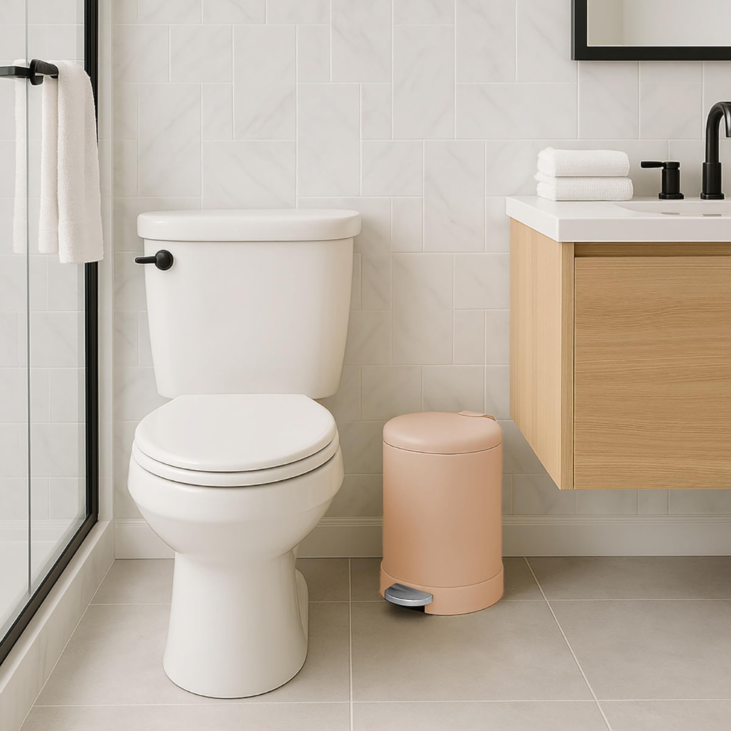 Hands-free step pedal on the Glad trash can enables touchless disposal.