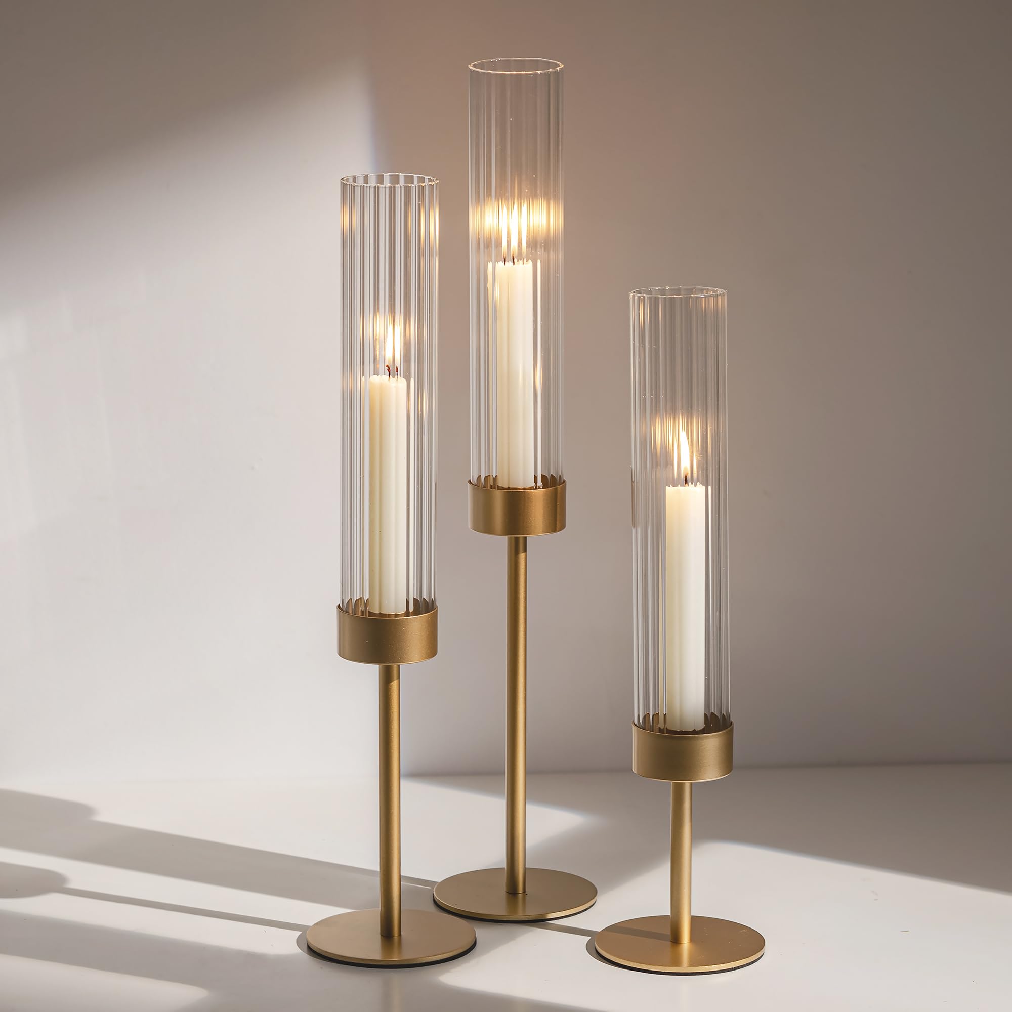 Glasseam gold hurricane taper holder assembly demonstrates stable, elegant centerpiece