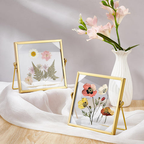 Glasswinds gold floating frame turns DIY petals into chic table art.