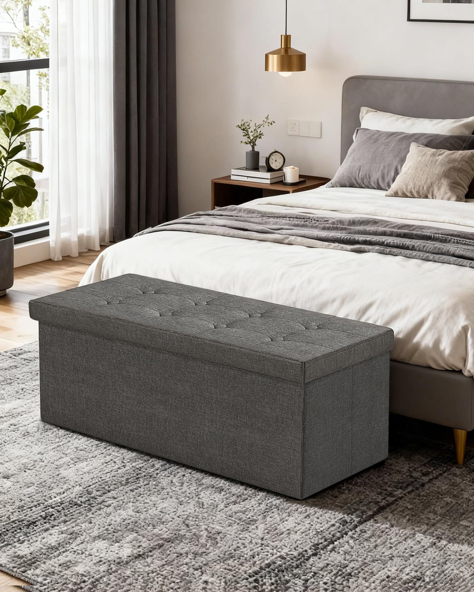 GLAXYFUR ottoman with removable divider keeps items neatly organized.