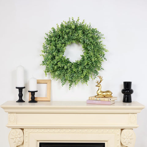 GLIDLION boxwood wreath measures 26 inches in diameter for bold front-door styling