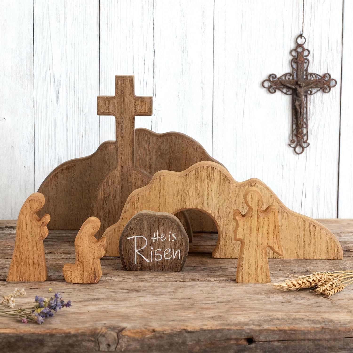 Glintoper detailed tomb and cross wood craft serves as a gentle focal point.
