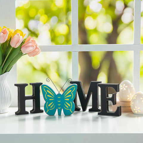 Glitzhome home sign snowman icon evokes cozy winter scenes