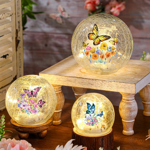 Glooglitter butterfly-pattern lamps highlight intricate motifs for any shelf