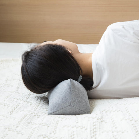 GLORY SEASON round neck pillow grey with ergonomic bone-like design.