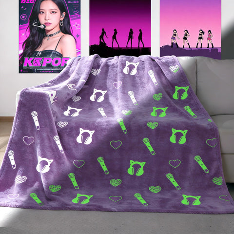 Glowvibe glow-in-the-dark blanket with Demon Hunters design for cozy nights.