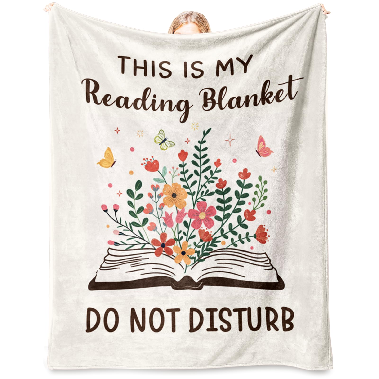 Glydein Book Lovers Blanket on sofa for cozy reading sessions.