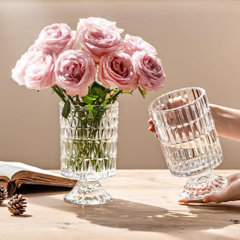 Goaste embossed vase 7-inch clear glass complements bright blooms.