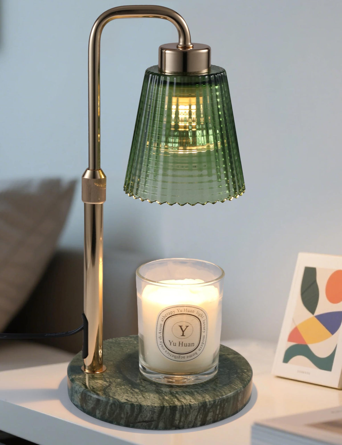 GODONLIF candle warmer on green marble base providing flame-free ambiance.