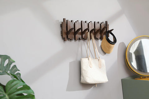 GOGREEBELL artistic wood wall art style coat rack adds warmth.