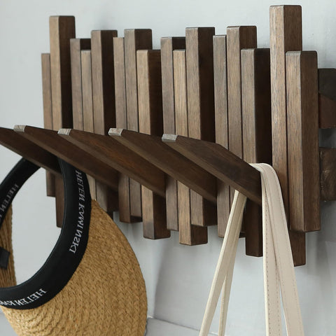 GOGREEBELL wall hook rack stores coats and hats neatly in an entryway.