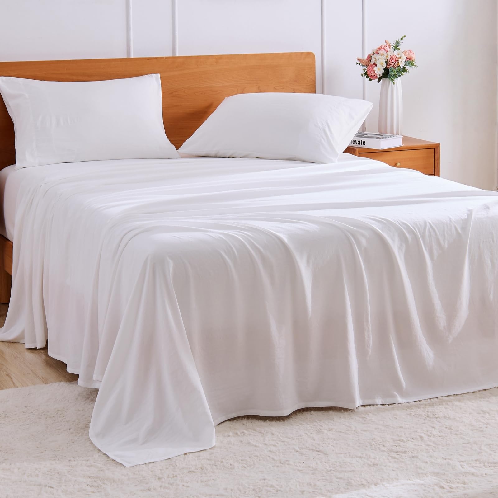 GOKOTTA 4-Pcs King Size Sheets Set on bed for hotel-like comfort.