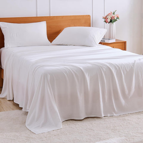 GOKOTTA 4-Pcs King Size Sheets Set on bed for hotel-like comfort.