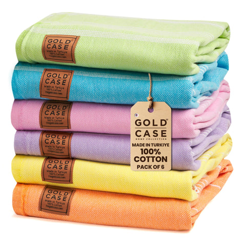 Gold Case Lycia towels in vibrant colors for quick-dry beach days.