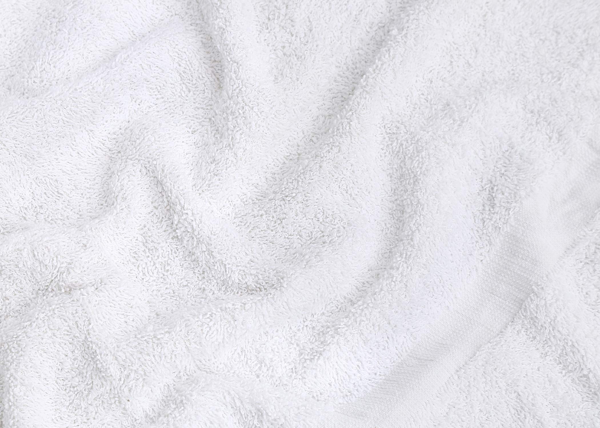 GOLD TEXTILES towels stacked for hotel, spa, or pet care facilities.