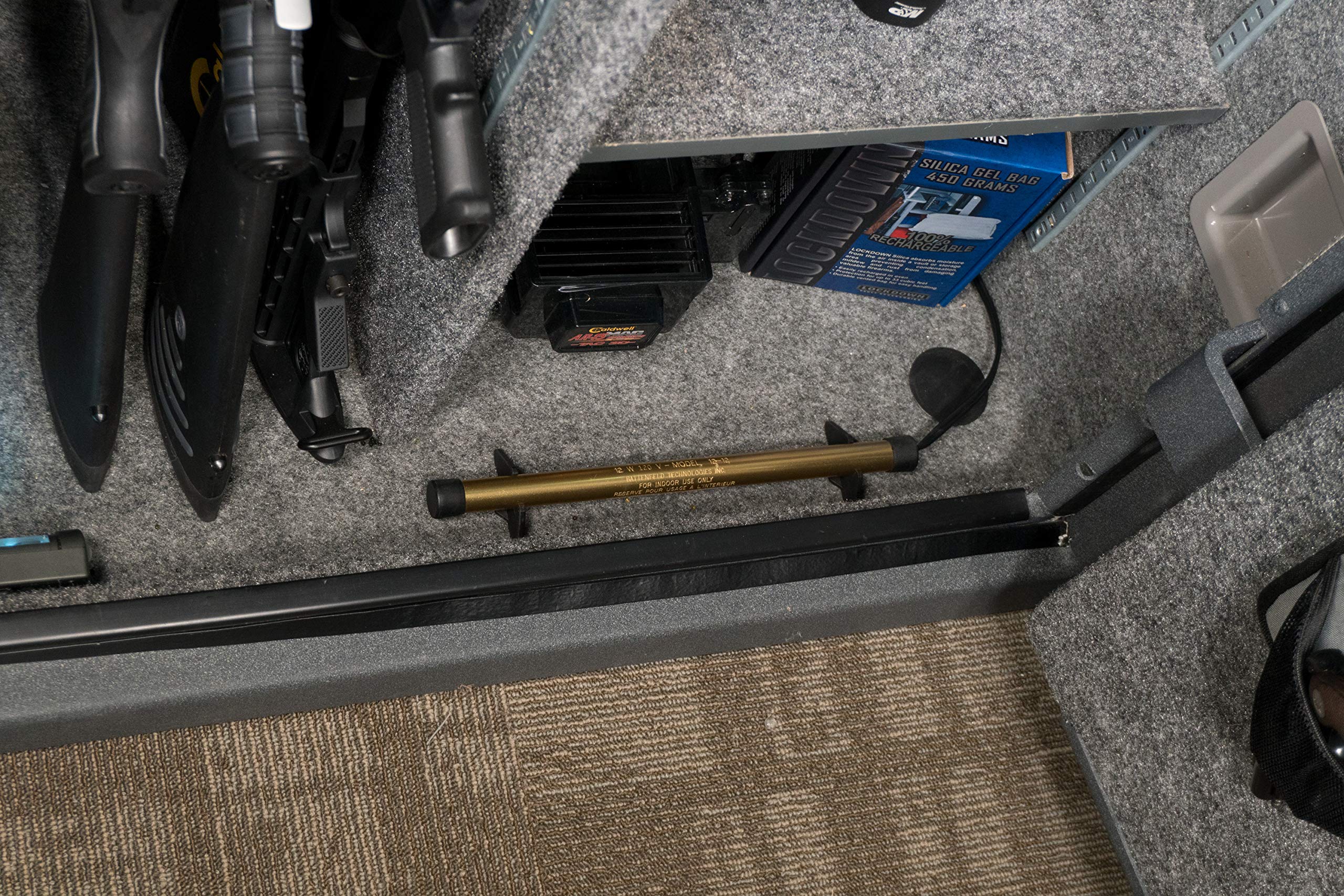 Goldenrod Lockdown dehumidifier rod with attachable legs for easy placement.