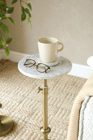 Goodinough adjustable-height marble drink table compact design fits small spaces.
