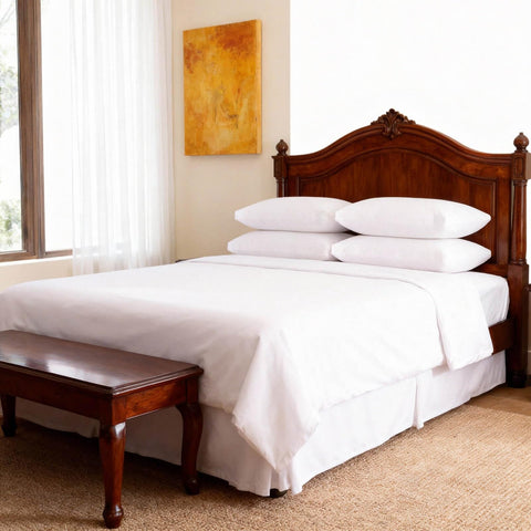 Cozy bedroom scene with pillows on a bed, highlighting cooling fill.