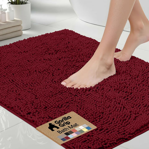 Gorilla Grip bath rug 30x20 burgundy soft chenille captures moisture for a warm bathroom floor.