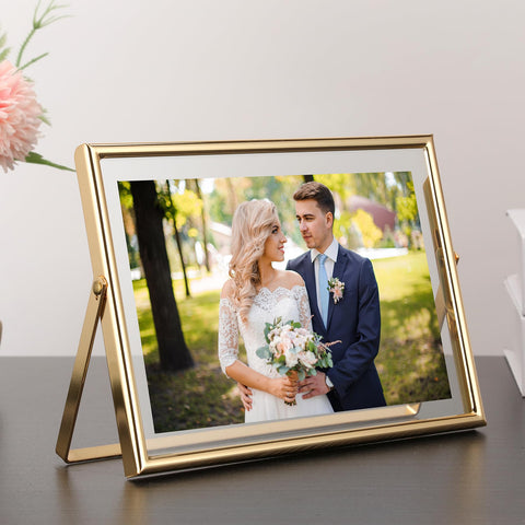 GorYeeFine gold frame in hand shows substantial weight and premium finish.