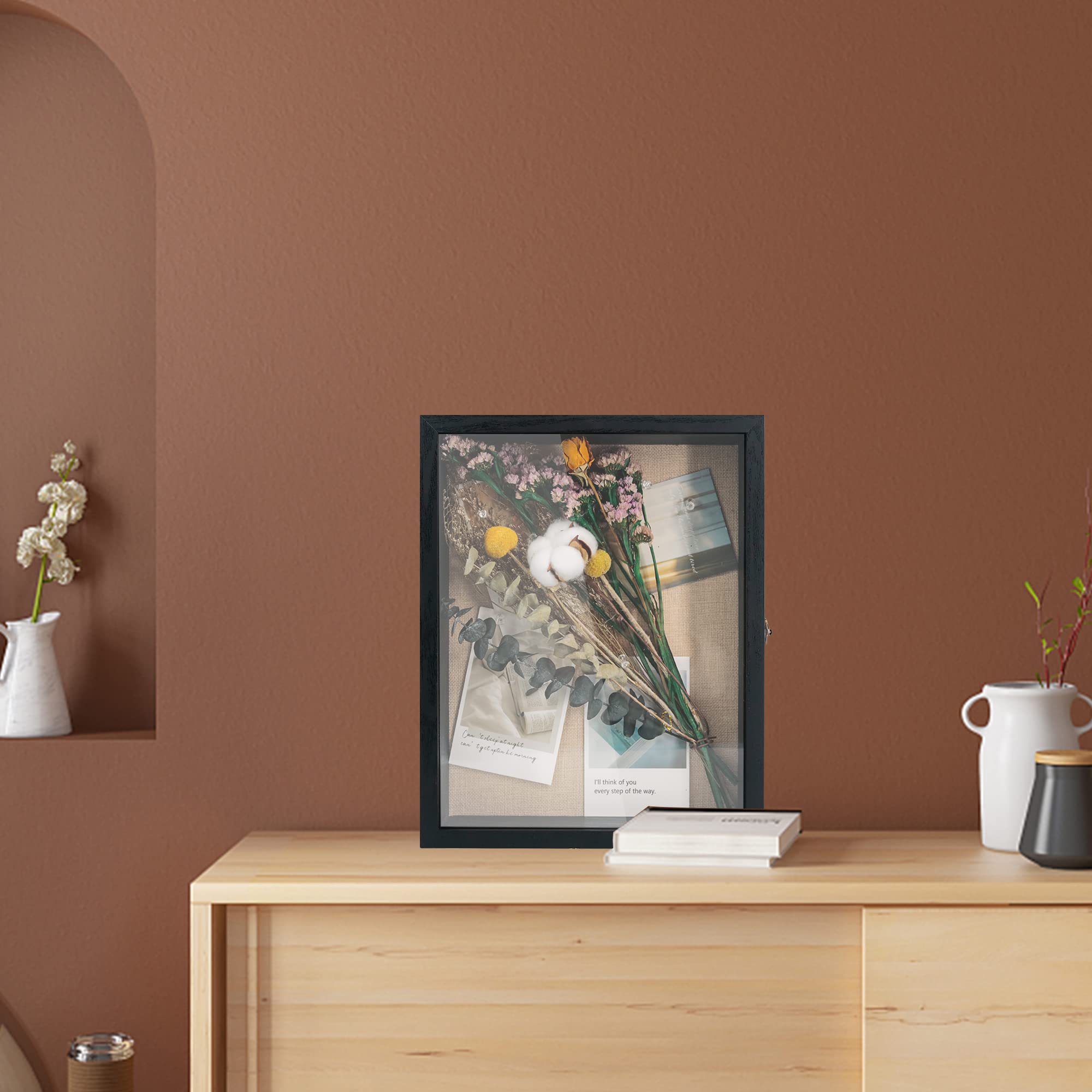 GraduatePro shadow box 11x14 hinged door makes swapping memories quick and clean.
