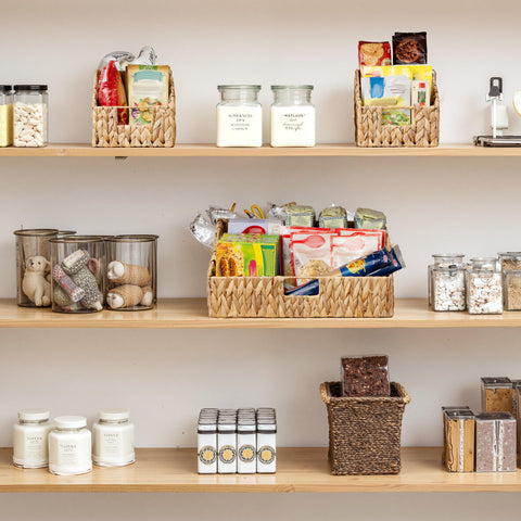 GRANNY SAYS decorative wicker basket adds style while organizing toiletries.