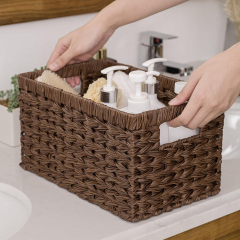 GRANNY SAYS bathroom-ready basket resists moisture for neat towel storage.