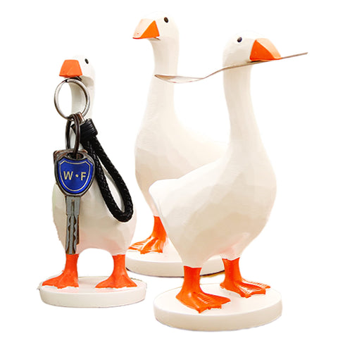 GRAPMKTG magnetic goose key holder with beak securely holds keys on your desk.