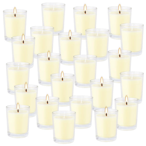 Close-up of glass cup with yellow citronella candle for warm indoor decor