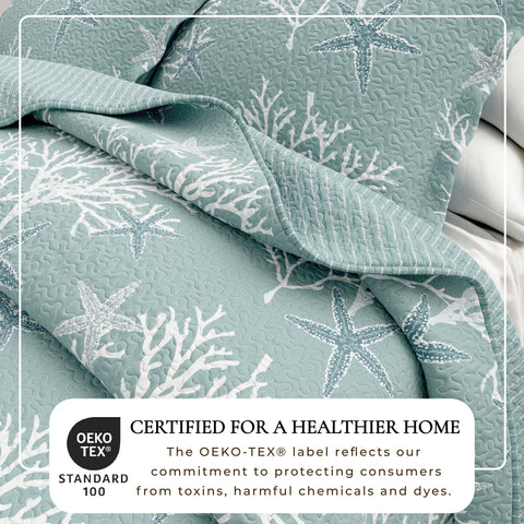 Great Bay Home Ether Blue shams complement the quilt with nautical flair